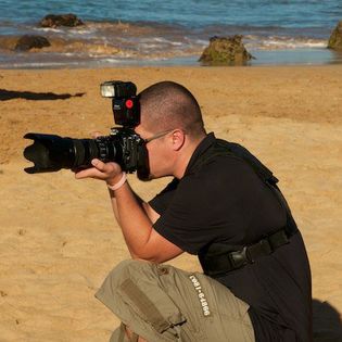 Photographer capturing photos near beach