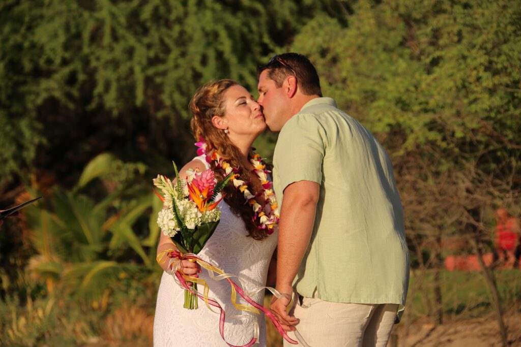 Maui beach wedding sealed with a kiss
