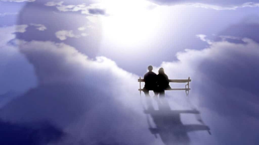 Couple sitting together in heaven