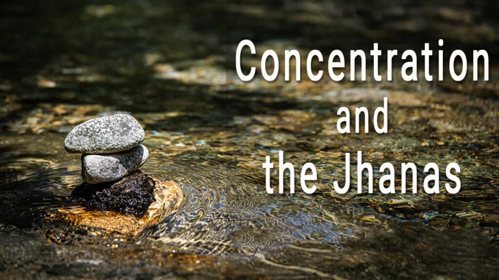 Stacked stones balancing on a rock by a flowing river with a motivational quote.