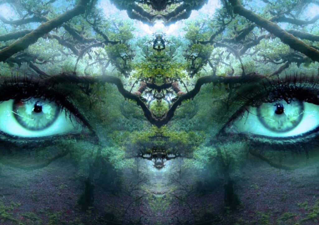 Close-up of mystical blue eyes with intricate symmetrical patterns.