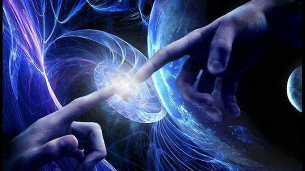 Two hands nearly touching with glowing energy between them.