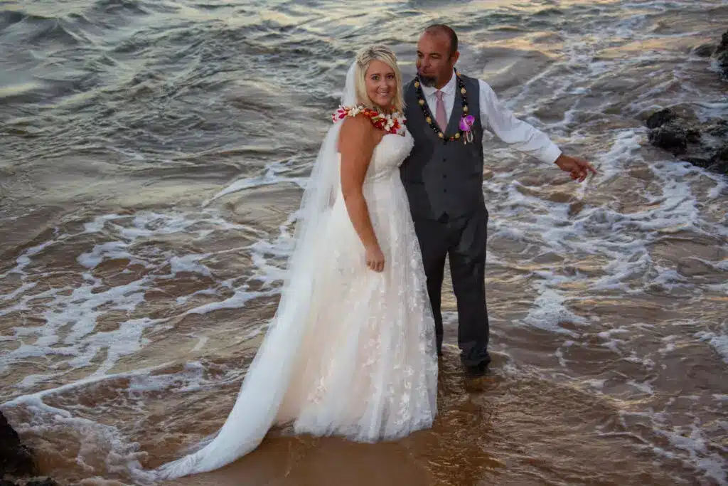 Groom and Bride on the beach getting married in Maui