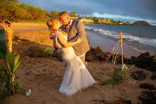 couple Posing for a photo after a wedding ceremony in maui