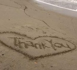 Heart in the sand with the words Thank You